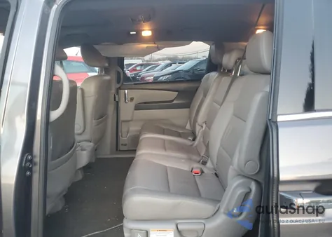 2015 Honda Odyssey Touring z USA, uszkodzony, nr VIN 5FNRL5H9XFB027926